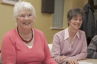 2. Photograph of two women at an adult education centre